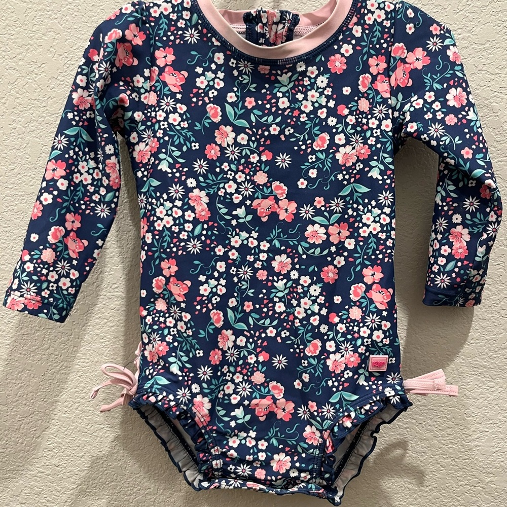 Ruffle Butts Navy Floral Baby Bodysuit